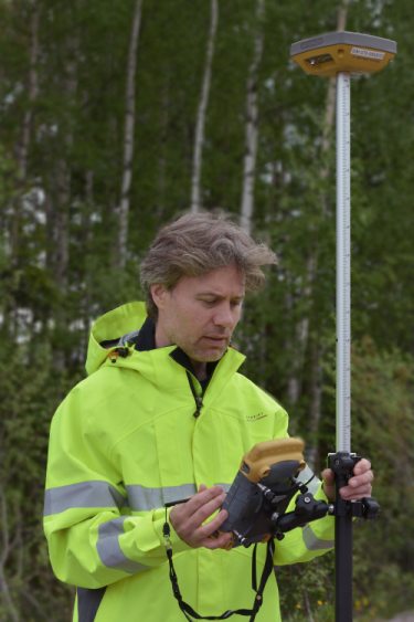 Engineer performing RTK measurement.